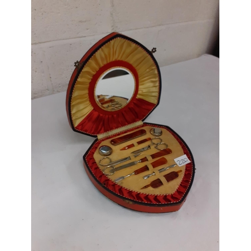 220 - Bakelite Manicure Set in Musical Box.