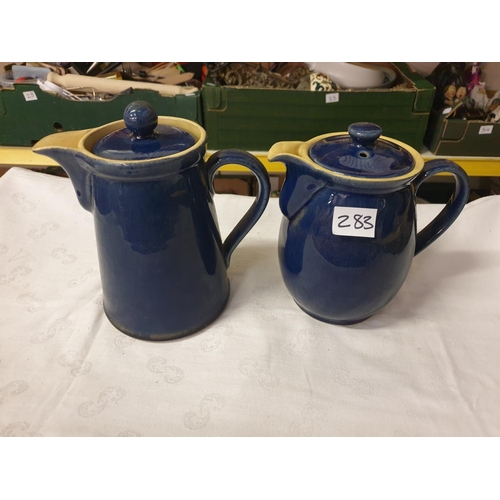 283 - Two Denby Stoneware Blue Lidded Water Jugs.