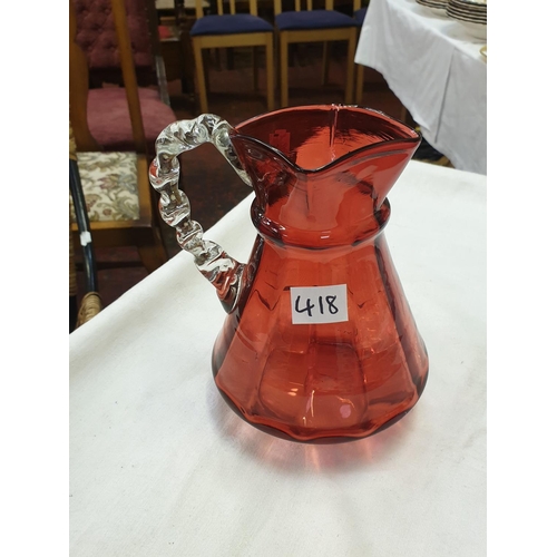 418 - 19cm Tall Cranberry Glass Jug with Square Top.