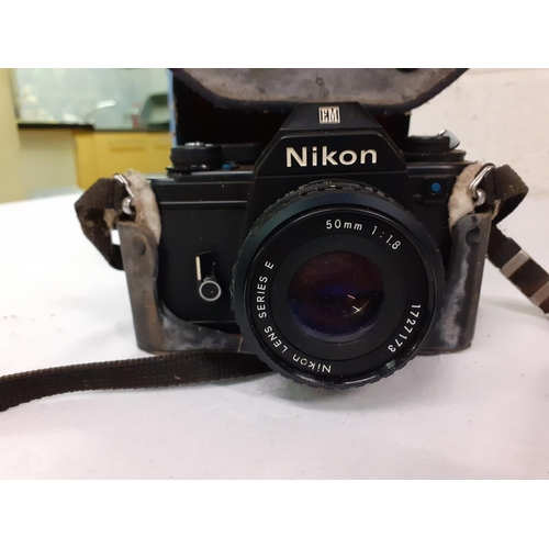 211 - Vintage Nikon EM Camera in Case.