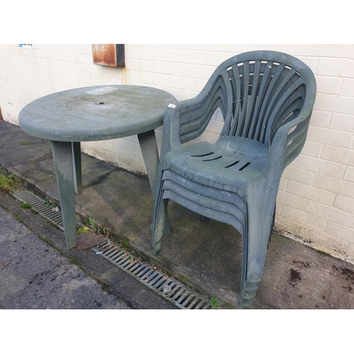 664 - Green Plastic Circular Patio Garden Table with Four Matching Chairs & Two Wooden Folding Chairs.