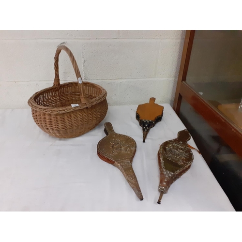 106 - Woven Wicker Hand Basket & Three Pairs of Fire Bellows.