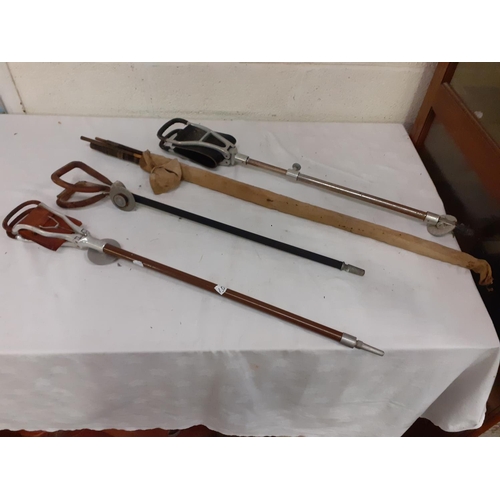 130 - Vintage Cane Fishing Rod & Three Shooting Sticks.