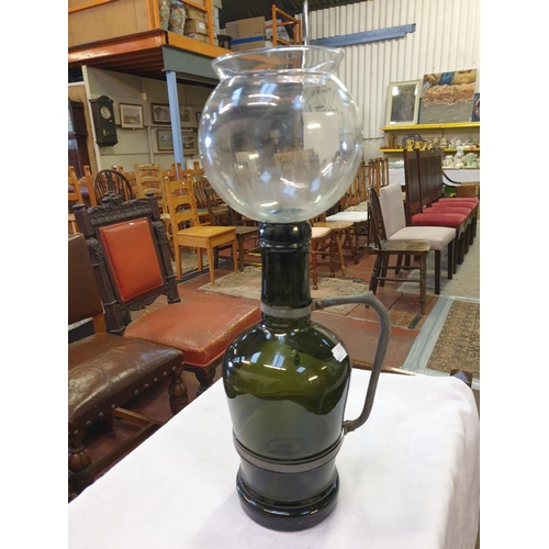 217 - Large Green Glass Jug with Metal Handle & Glass Funnel - chip to the neck of the jug.