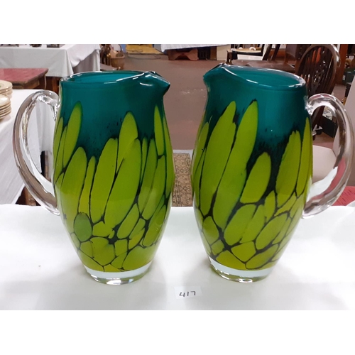 417 - Pair of 24cm Tall Mottled Green & Yellow Glass Jugs.