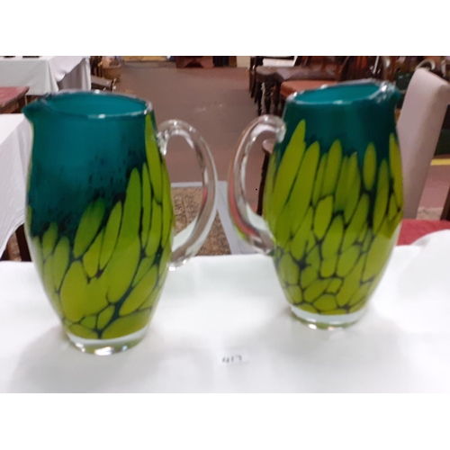 417 - Pair of 24cm Tall Mottled Green & Yellow Glass Jugs.