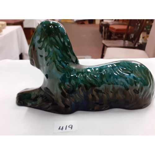 419 - Blue Mountain Pottery Green Drip Glaze Seated Spaniel Length c.23.5cm (c.9.25”).