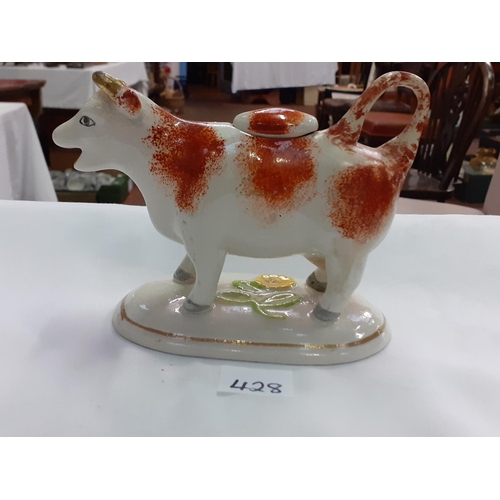 428 - Staffordshire Spongeware Cow Creamer & Lid.