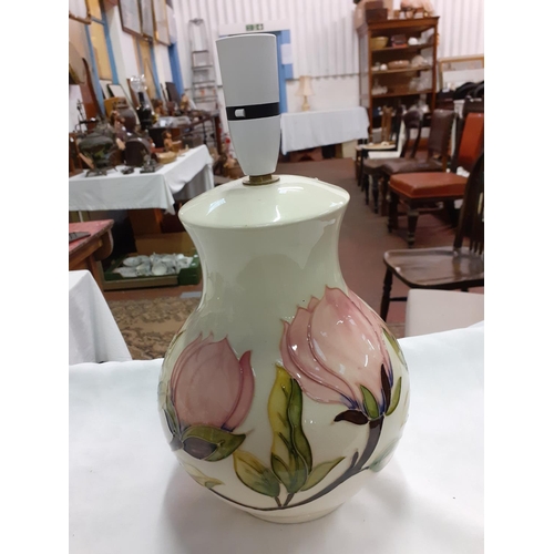 435 - Large Moorcroft Cream Ground Pink Magnolia Lamp Base Height c.32cm (c.12.5”) to be re-wired.