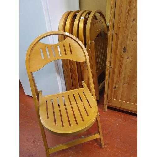 588 - Set of Six Folding Solid Beech Chairs.