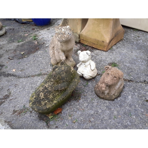 659 - Four Concrete Garden Figures - Pig in Bath, Pig & Piglet, Sitting Cat & Teddy Bear.