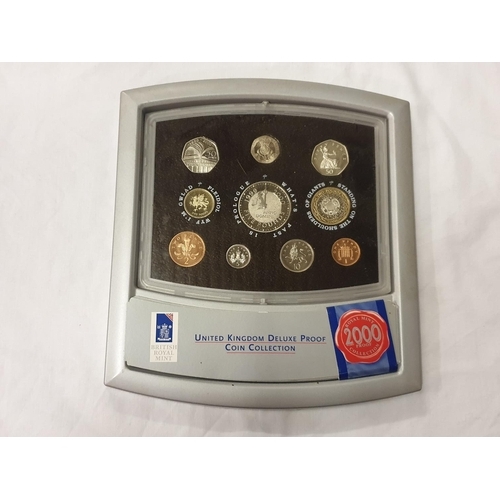 457 - United Kingdom British Royal Mint Deluxe 2000 Coin Collection in Spinner Stand.