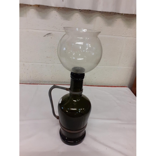 223 - Large Green Glass Jug with Metal Handle & Glass Funnel - chip to the neck of the jug.