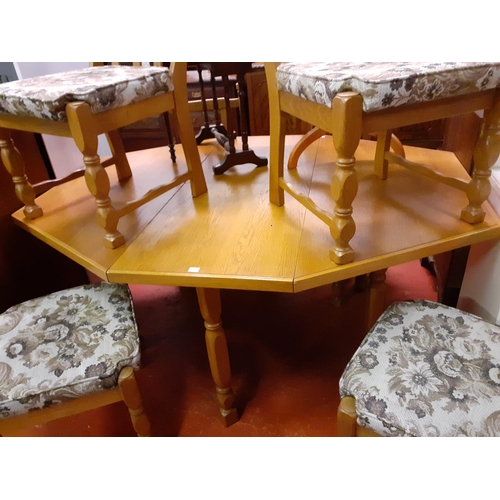 569 - Solid Oak Extending Octagonal Dining Table with Set of Six Solid Oak Chairs.