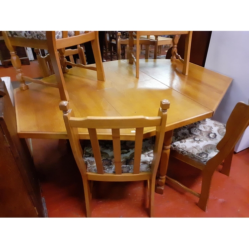 569 - Solid Oak Extending Octagonal Dining Table with Set of Six Solid Oak Chairs.