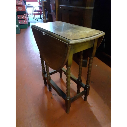 623 - Oval Oak Drop Leaf Table with Bobbin Legs - 35