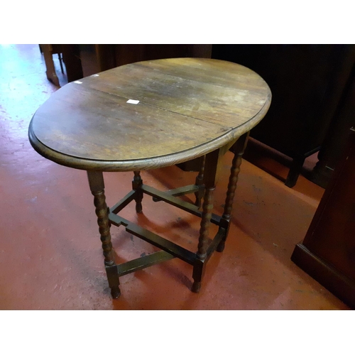 623 - Oval Oak Drop Leaf Table with Bobbin Legs - 35