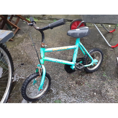 658 - Child's Booster Raleigh Bike.