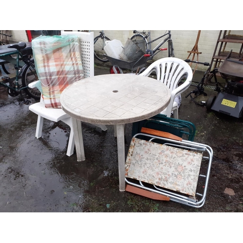 659 - Circular White Patio Table with Two White Chairs & Other Garden Chairs with Cushions.