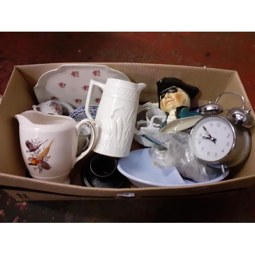 73 - Box of China to Include Jugs, Plates, Character Jugs & Mantel Clock.