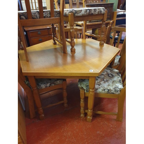 569 - Solid Oak Extending Octagonal Dining Table with Set of Six Solid Oak Chairs.