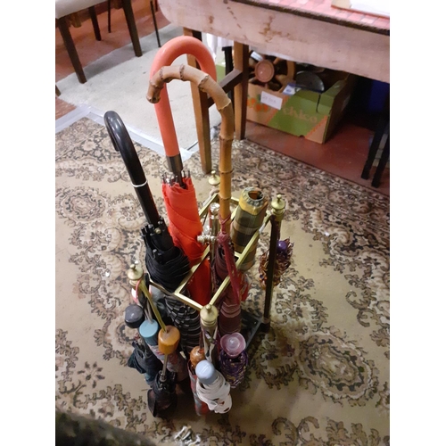 101 - Brass & Cast Umbrella Stand with Quantity of Umbrellas.