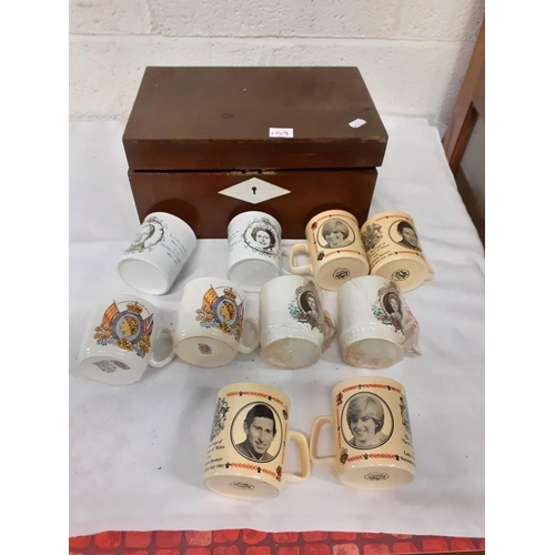 159 - Vintage Oak Box with a Selection of Commemorative Mugs.