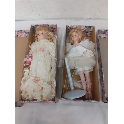 166 - Two Boxed Vintage Porcelain Dolls.