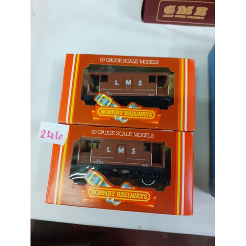 246 - Two Boxed Hornby Railways 00 Gauge LMS Brake Vans R.718.