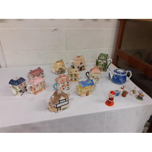 45 - Box of Novelty Cottage and House Teapots.