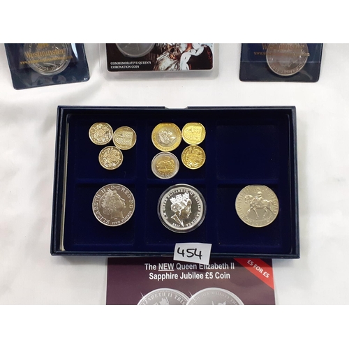 454 - Four £5 Commemorative Coins along with Other Crowns & Coins.