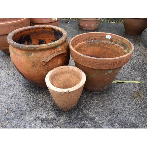 670 - Three Terracotta Garden Pots - urn style is 13