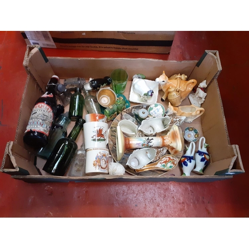 144 - Box to Include Vintage Bottles, Cow Creamers, Ceramic Shoes, Figures etc.