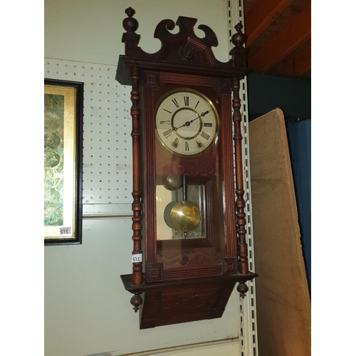 512 - Mahogany Cased & Heavily Carved Clock with Pendulum - approx 37.5