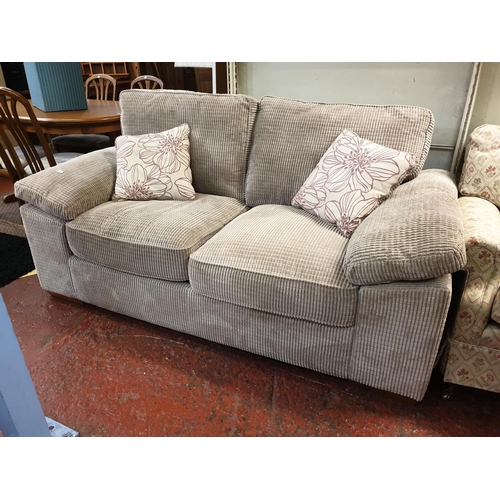 522 - Beige Textured Fold-Out Action Double Sofa Bed with Matching Cushions.