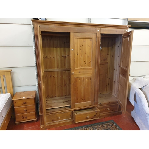 537 - Solid Pine Triple Wardrobe with Three Base Drawers, Full Hanging Rail & Double Shelf.