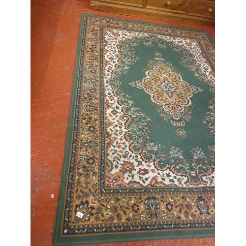 539 - Green Floral Patterned Rug - approx 160cm x 227cm.