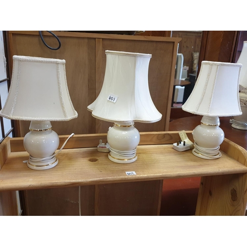 601 - Set of Three Cream Based Table Lamps with Shades.