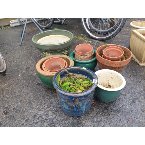 669 - Quantity of Terracotta & Ceramic Glazed Garden Pots.