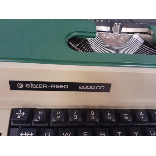 122 - Cased Silver Reed Model SP8700 Electric Typewriter.