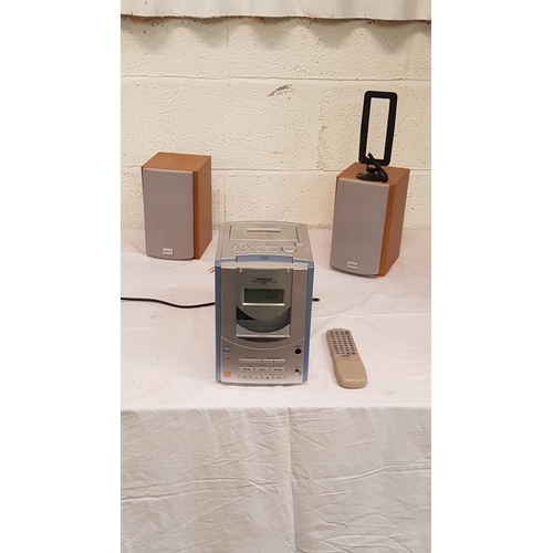 106 - Hitachi Micro CD Music System with Speakers & Remote.