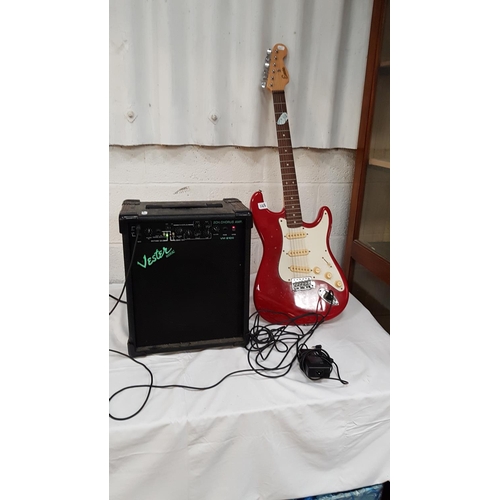 148 - Red & White Encore Electric Guitar with Vester Maniac VM-210C Amplifier.