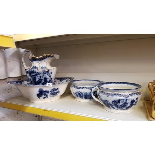 282 - Four Piece Blue & White Dresser Jug & Bowl with Two Matching Chamber Pots.