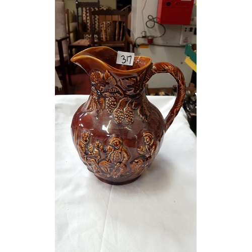 317 - Glazed Arthur Wood Treacle Jug.