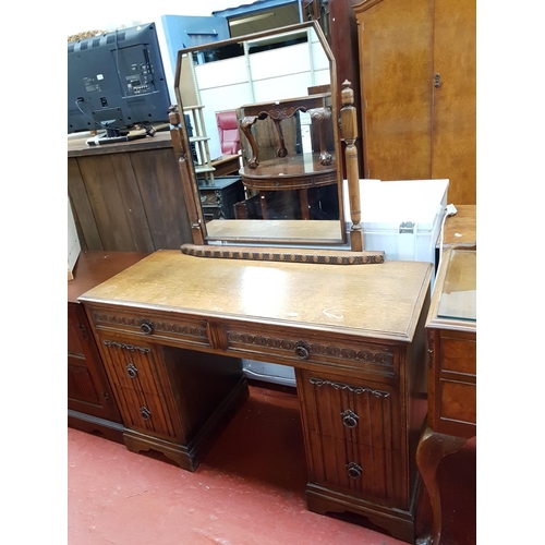 599 - Oak Six Drawer Linen Fold Dressing Table with Single Mirror Back.