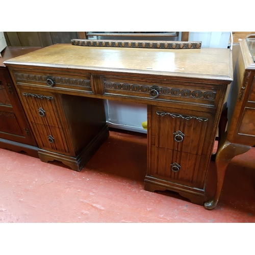 599 - Oak Six Drawer Linen Fold Dressing Table with Single Mirror Back.