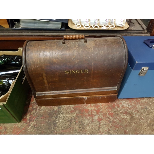 116 - Vintage Singer Sewing Machine in Oak Case.