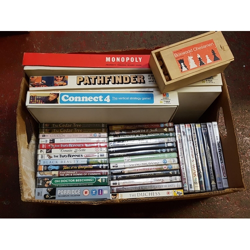 39 - Box of Assorted Games, Jigsaw Puzzles, DVD's.