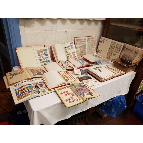 54 - 12 Stamp Albums with Stamps.