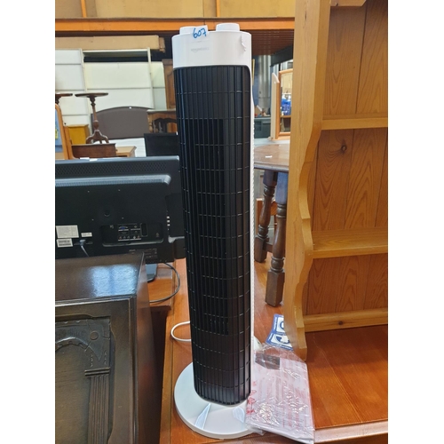 607 - As NEW Amazon Basics Oscillating Tower Fan.